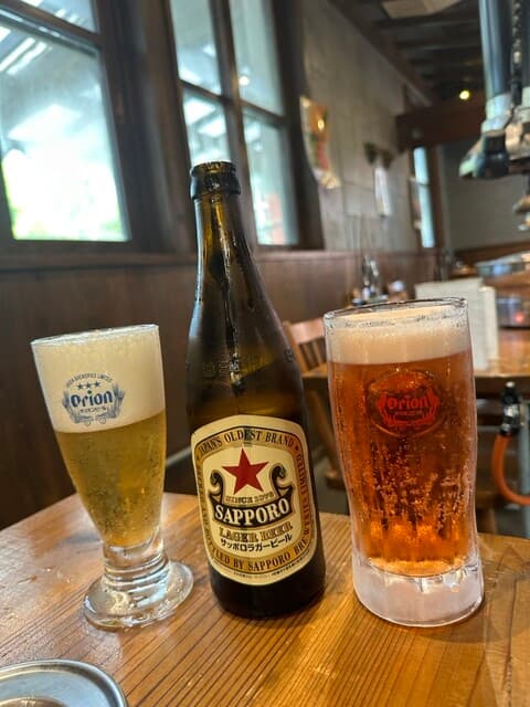 琉球焼肉NAKAMA - 赤星おかわりとハイビスカスビール　ハイビスカスビール少し酸っぱい味わい。さっぱりしてた。