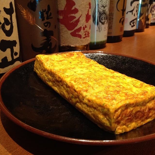 小料理 哲  - 自家製だし巻き卵