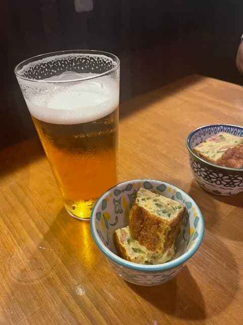 中華バル 藍天 - お通しはゴーヤ入りのたまごやき