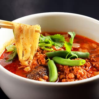 A master chef creates exquisite noodles. A numbingly spicy Mara knife noodle dish.